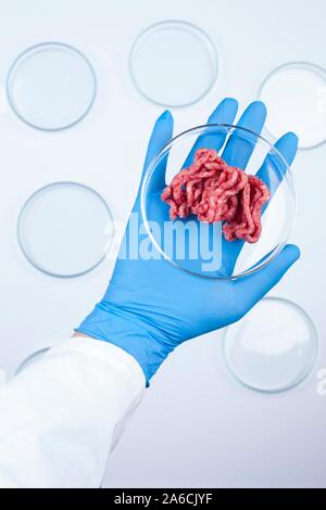 Immagine concettuale della carne coltivate coltivate in laboratorio. Foto Stock