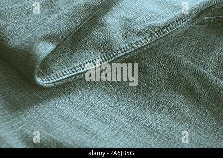 Ripiegate purista jeans blu abstract background. Messa a fuoco selettiva Foto Stock