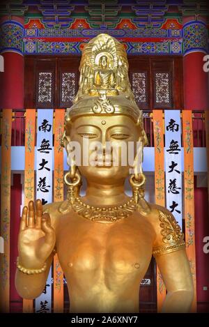 Buddha al Tempio di Chongsheng. Tempio buddista originariamente costruito nel 9 ° secolo vicino alla città vecchia di Dali nella provincia di Yunnan, Cina meridionale. Foto Stock