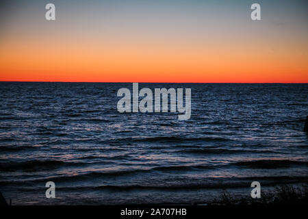 Tramonto sulla baia di sorella in Door County, Wisconsin Foto Stock