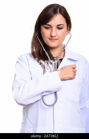 Close up di bella donna medico utilizzando uno stetoscopio su se stessa Foto Stock