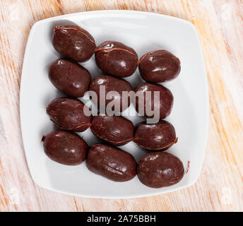In stile spagnolo materie morcilla (salsiccia di sangue con riso) sulla piastra bianca Foto Stock