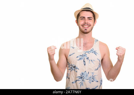 Felice giovane bello barbuto uomo turistico pronto per le vacanze Foto Stock