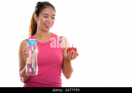 Studio shot della giovane donna asiatica pronta per la palestra Foto Stock