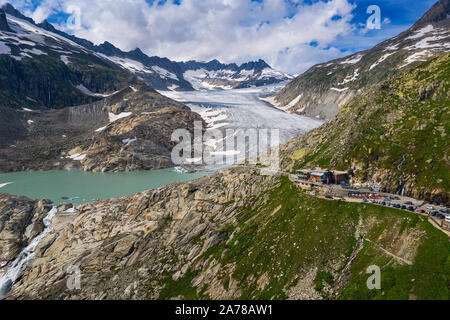 Vista aerea della fusione ghiacciaio del Rodano e il lago glaciale nelle Alpi Svizzere Foto Stock