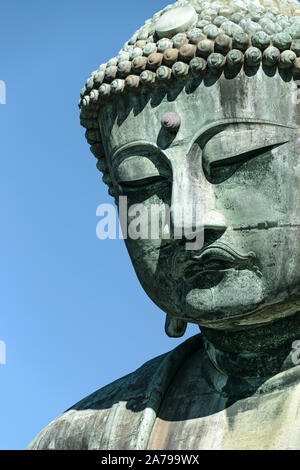 Il grande Buddha di Kamakura, testa di close-up Foto Stock