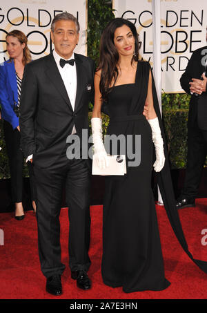 LOS ANGELES, CA - 11 gennaio 2015: George Clooney & Amal Alamuddin Clooney presso la 72Annuale di Golden Globe Awards presso il Beverly Hilton Hotel di Beverly Hills. © 2015 Paul Smith / Featureflash Foto Stock