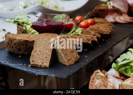 Vicino sul pate con mirtillo palustre Foto Stock