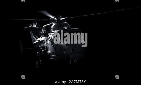 La Royal Navy Wildcat elicottero passando sotto la luce diretta del sole. Foto Stock