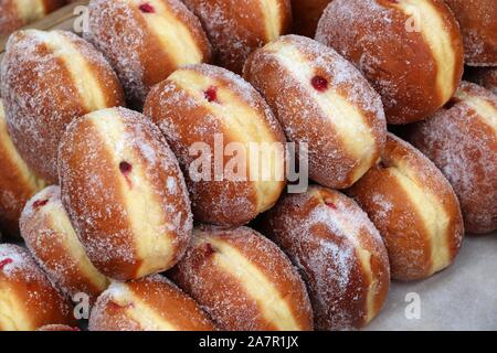 Ciambelle inglese (ciambelle) a Londra Spitalfields Market. Foto Stock