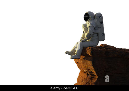 Astronauta sul pianeta Marte seduto su una rupe isolata su sfondo bianco Foto Stock