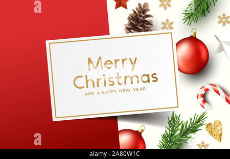 Una composizione di una serie di decorazioni di Natale, con spazio per un messaggio. Foto Stock