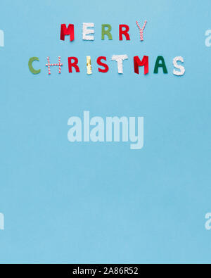 Auguri di Buon Natale calendario creative con testo colorato in blu Foto Stock