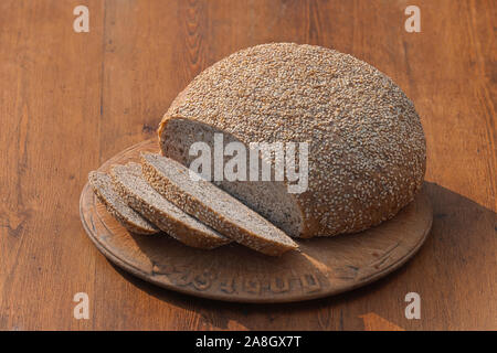 Sei round di granella di pasta acida pagnotta di pane Foto Stock