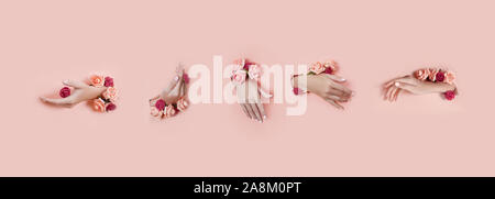 Impostare le mani con fiori artificiali fuori del foro rosa lo sfondo della carta. Mano in pose diverse, il modello layout per il collage. Cosmetici ha Foto Stock