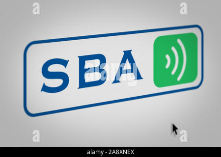Logo della società pubblica di comunicazioni SBA visualizzata sullo schermo di un computer in close-up. Credito: PIXDUCE Foto Stock