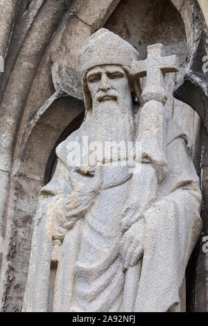 Scultura scolpita sulla parte esterna della Cattedrale di Exeter nella città di Exeter in Devon, Regno Unito. Foto Stock