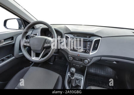 Panorama in cuoio interno salone di prestigio auto moderna. Il volante, la leva del cambio e il cruscotto Foto Stock