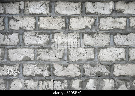 Texture: muro grigio con mattoni di argilla espansa e cemento - sfondo Foto Stock