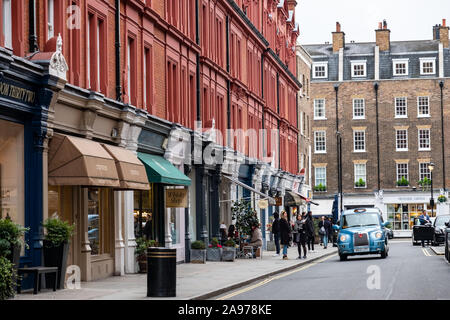 Chiltern Street nel quartiere di Marylebone di West London- un premio di shopping con lussuosi negozi e luoghi della vita notturna Foto Stock