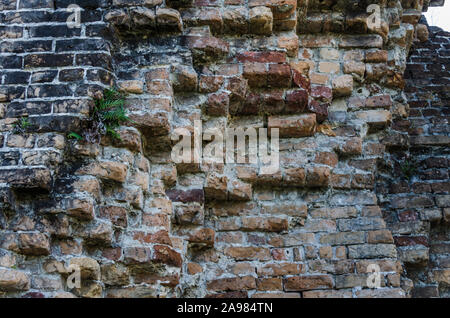 Muro di mattoni, eccellente rustico sfondo astratto o uno sfondo Colori e dettagli in questa splendida annata muro di mattoni, costruito anni fa. Foto Stock