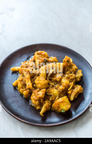 Il Cibo indiano piccante Masaledar, Aloo Gobi e fagioli Tawa Sabzi ricetta. I cibi tradizionali. Foto Stock