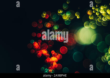 Bella ottico colore astratti bokeh nelle tenebre dello sfondo. Foto Stock