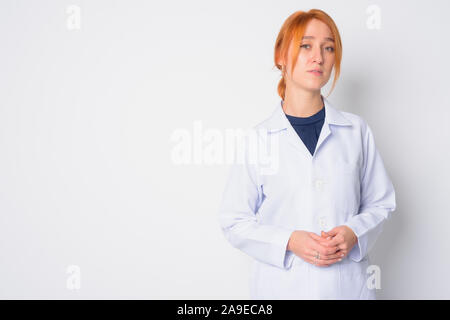 Ritratto di giovane bella donna redhead medico Foto Stock