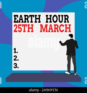 Conceptual la scrittura a mano che mostra Earth Hour 25Marzo. Concetto simbolo significato impegno al pianeta organizzata World Wide Fund vista posteriore uomo vestito sta Foto Stock