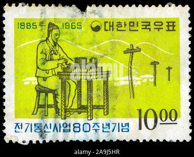 Francobollo dalla Corea del Sud con il telegrafo operatore serie emessa nel 1965 Foto Stock