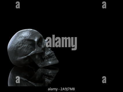 Cranio colore nero isolato in background 3D render Foto Stock