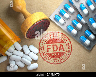 La FDA ha approvato concetto. Timbro di gomma con la FDA e pillole sulle imbarcazioni di carta. 3d illustrazione Foto Stock