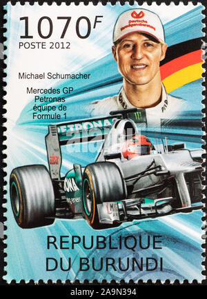 Driver di Formula 1 Michael Schumacher sul francobollo Foto Stock