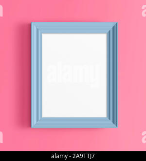 Blue photo frame sulla parete rosa Foto Stock