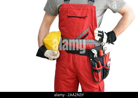 Allegro lavoratore edile - artigiano in abiti da lavoro su sfondo bianco - isolato Foto Stock