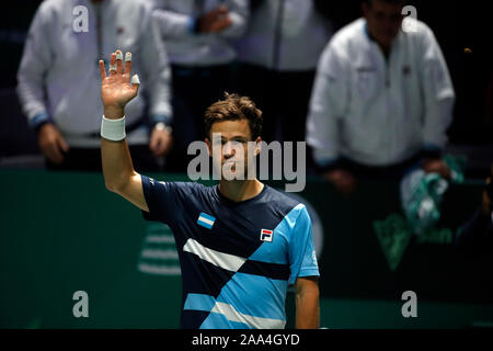 Diego Schwartzman dell Argentina celebra la vittoria durante la singles match contro Cristian Garin del Cile il giorno 2 del 2019 Davis Cup presso la Caja Magica. Foto Stock