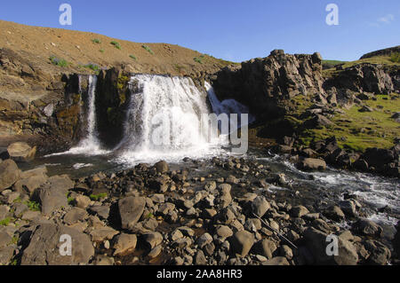 La cascata e rocky stream-letto, Hvalfjordur, west Islanda. Foto Stock