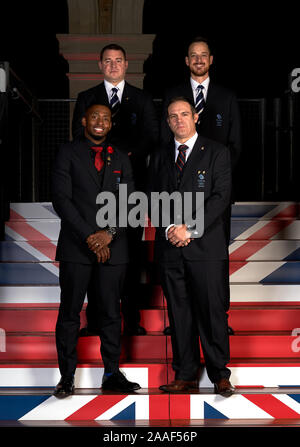 Team GB 4 uomo Bob team dall'Sochi 2014 Olimpiadi invernali comprendente di John Jackson, Bruce Tasker, Stuart Benson e Joel Fearon chi sarà a ricevere le loro medaglie di bronzo durante la BOA cena annuale, Old Billingsgate, Londra. Foto Stock