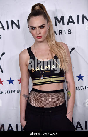 Los Angeles, Stati Uniti. 22 Novembre, 2019. Cara Delevingne arriva per il launch party per celebrare la sua collezione di moda la collaborazione con Puma e Balmain at Milk Studios di Los Angeles, California, giovedì 21 novembre, 2019. Foto di Chris Chew/UPI Credito: UPI/Alamy Live News Foto Stock