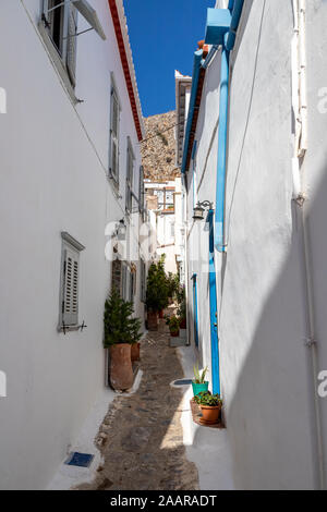 Percorso a piedi tra le case a Hydra Island, Grecia Foto Stock