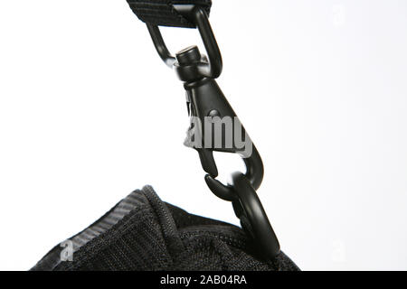 Metallo nero ganci a scatto per sacchetto. Foto Stock