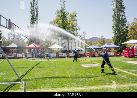 Fireman competere in estinzione australiana campionati, Tamworth Ottobre 2019 Foto Stock