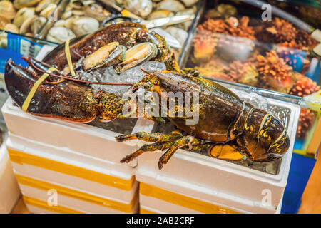 Pesce crudo a Noryangjin Pesca Mercato all'ingrosso a Seul, Corea del Sud Foto Stock