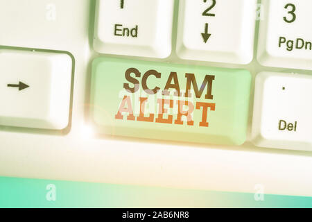 Conceptual la scrittura a mano che mostra Scam Alert. Concetto significato qualcuno di avvertimento circa il regime o avviso di frode qualsiasi insolito Foto Stock