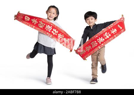 Felice i gemelli per celebrare il capodanno cinese Foto Stock