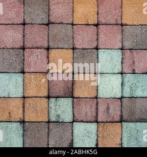 Ammattonato piastrella, vista dall'alto. Urban Texture come sfondo. Pavimentazione in pietra texture. In ciottoli di granito pavimentazione in background. Foto Stock