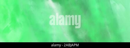 Banner grungy bella illustrazione spazzolato con grafica colorata verde pastello, verde pallido e tè verde verniciato colore. Foto Stock