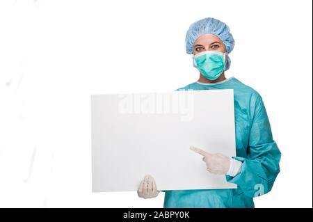 Arzt, Ärztin, OP-Schwester, mit weisser Tafel, signor: Sì, 25,30,35, Jahre, Foto Stock