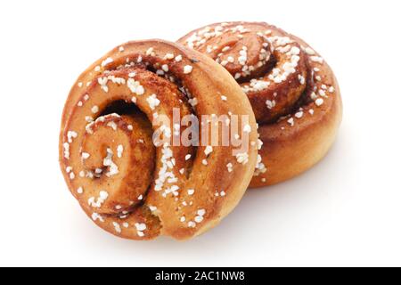 Due ciambelle alla cannella isolato su bianco Foto Stock