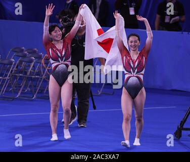 Tokyo, Giappone. 30 Novembre, 2019. Il Giappone sincronizzato trampolino femmina squad Takagi Yumi e Kishi Ayano prendere il primo posto all'Olympic Gymnastics Center di Ariake Giappone durante il XXXIV FIG Trampoline Gymnastics World Championships Sabato 30 Novembre, 2019. Foto di: Ramiro Agustin Vargas Tabares Credito: Ramiro Agustin Vargas Tabares/ZUMA filo/Alamy Live News Foto Stock